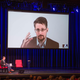 Edward Snowden promoting his book at a 2019 video conference in Berlin.